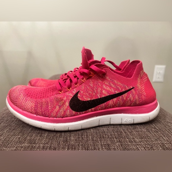 Nike Shoes - Pink Nike Fly Knit Running Shoes 
Size 8